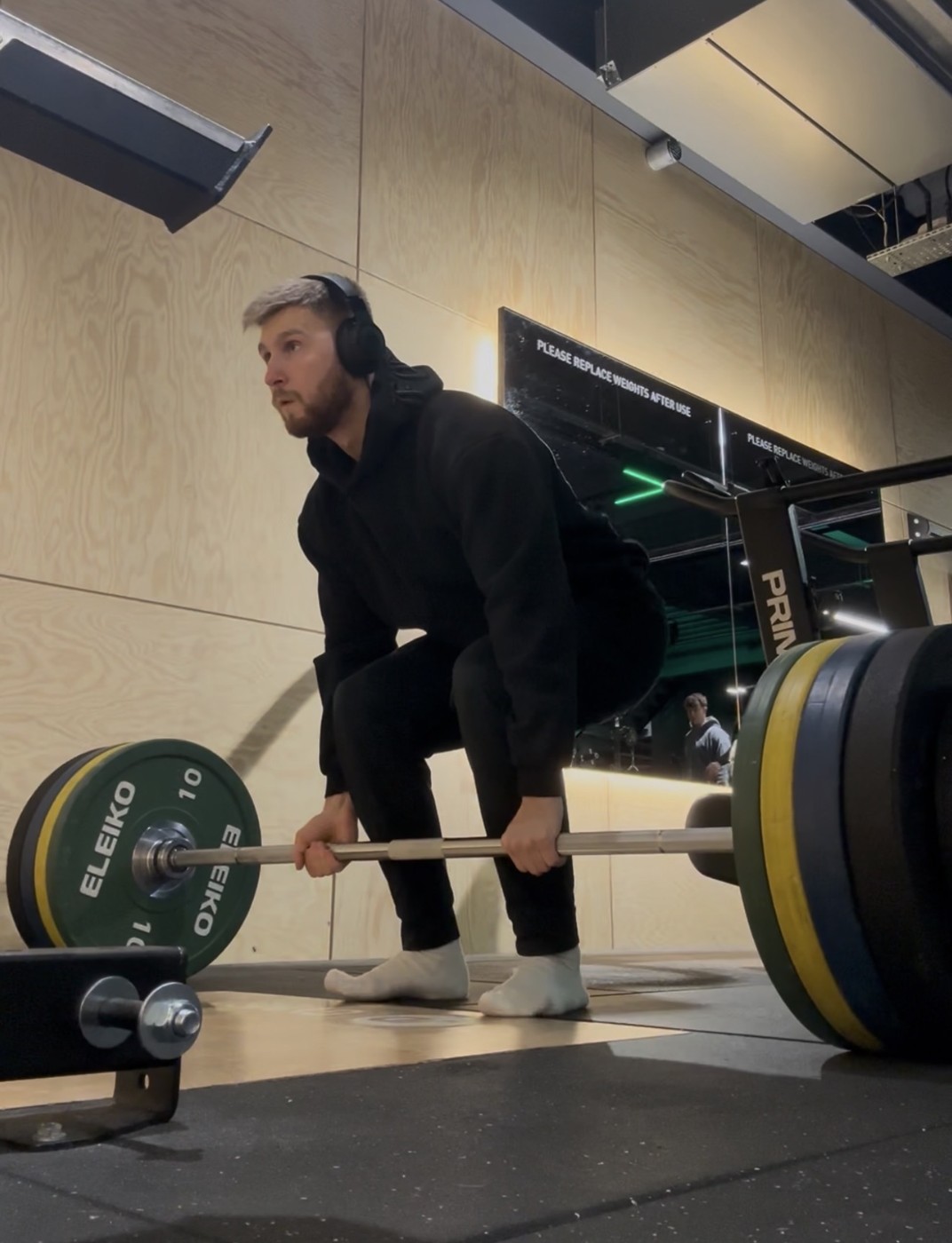 Oskar lifting a barbell
